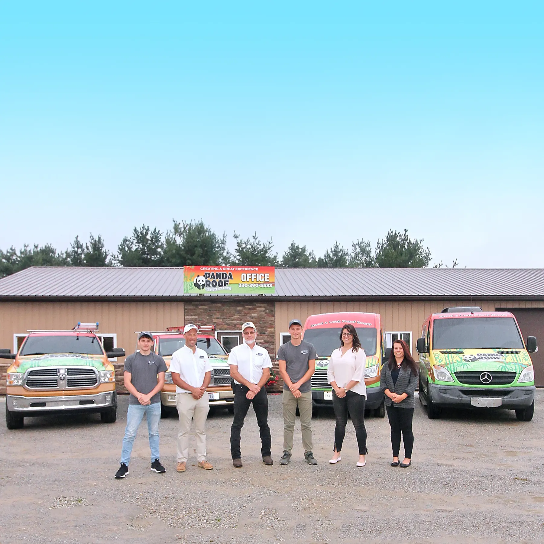 The Panda Roof team outside their Big Prairie, Ohio office with bamboo wrapped trucks and vans