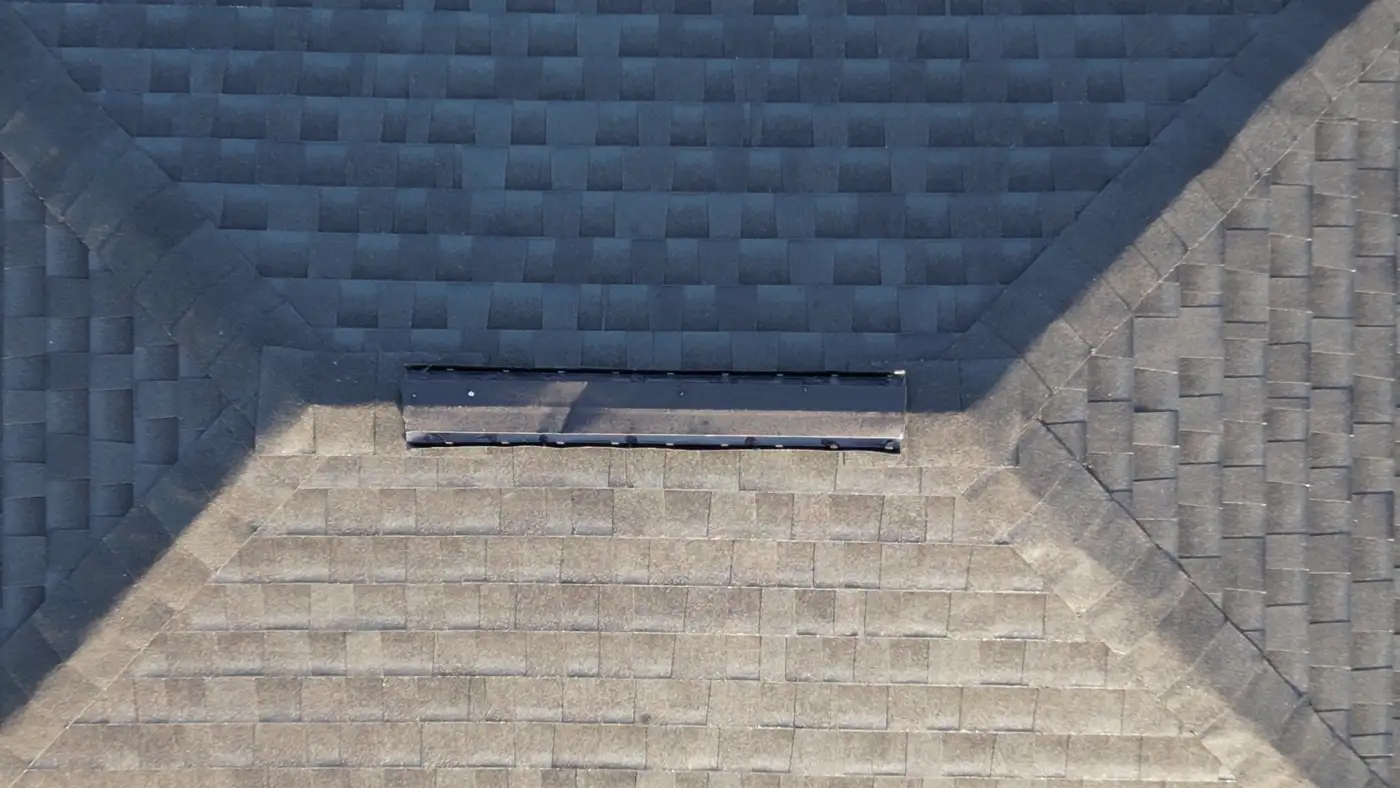A finished asphalt shingle roof seen from above